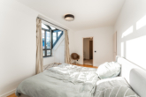 Schlafzimmer - 2,5 Zimmer Maisonettewohnung im Herzen Münchens