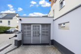 Einfahrt Tiefgarage - Schicke Neubauwohnung mit Stil & hochwertiger Ausstattung