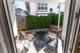 Terrasse - Traumhafte Maisonette-Gartenwohnung mit Saunahaus