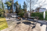 Terrasse - Traumhafte Maisonette-Gartenwohnung mit Saunahaus