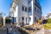 Terrasse - Traumhafte Maisonette-Gartenwohnung mit Saunahaus