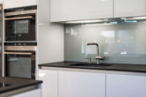 Küche - Traumhafte Maisonette-Gartenwohnung mit Saunahaus