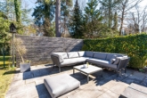 Terrasse - Traumhafte Maisonette-Gartenwohnung mit Saunahaus